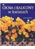 Okna i balkony w kwiatach