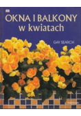 Okna i balkony w kwiatach
