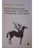 Podtrzymując radosne pozory trwania pochodu