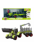 Traktor z łyżką i przyczepą do skręcania
