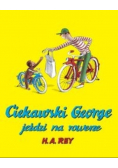 Ciekawski George jeździ na rowerze