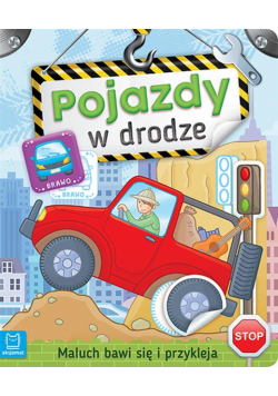 Maluch bawi się i przykleja. Pojazdy w drodze